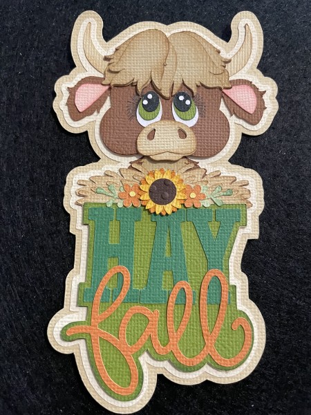 Handmade fall cow paper piecing with a hay and sunflower theme